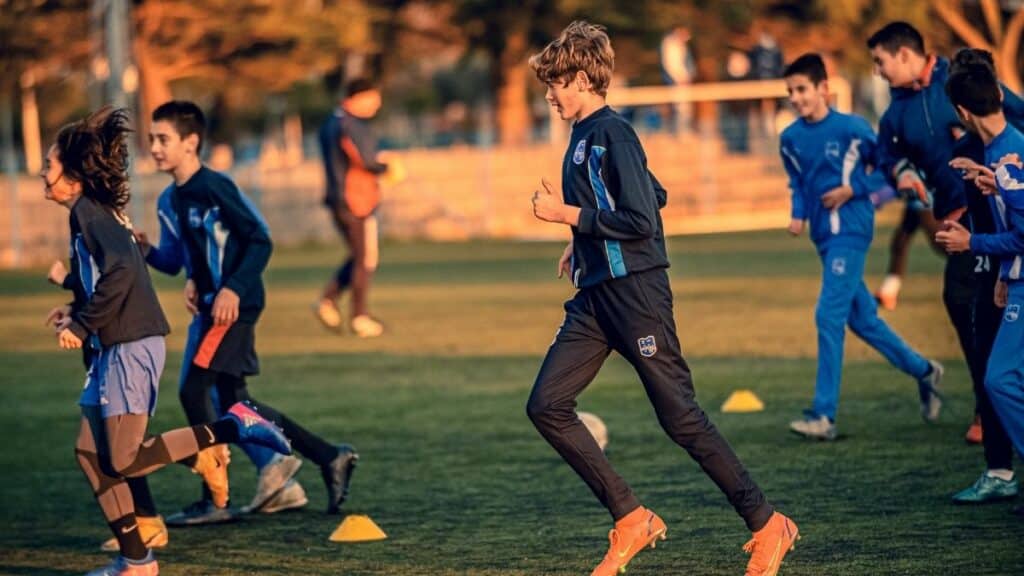 children team sports at school ielts essay